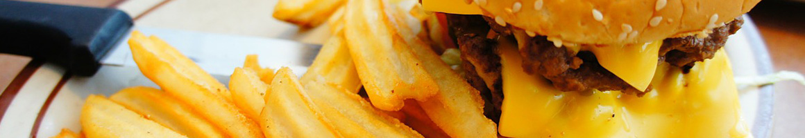 Eating Burger Hot Dog at R J's Hamburgers restaurant in Kenedy, TX.
